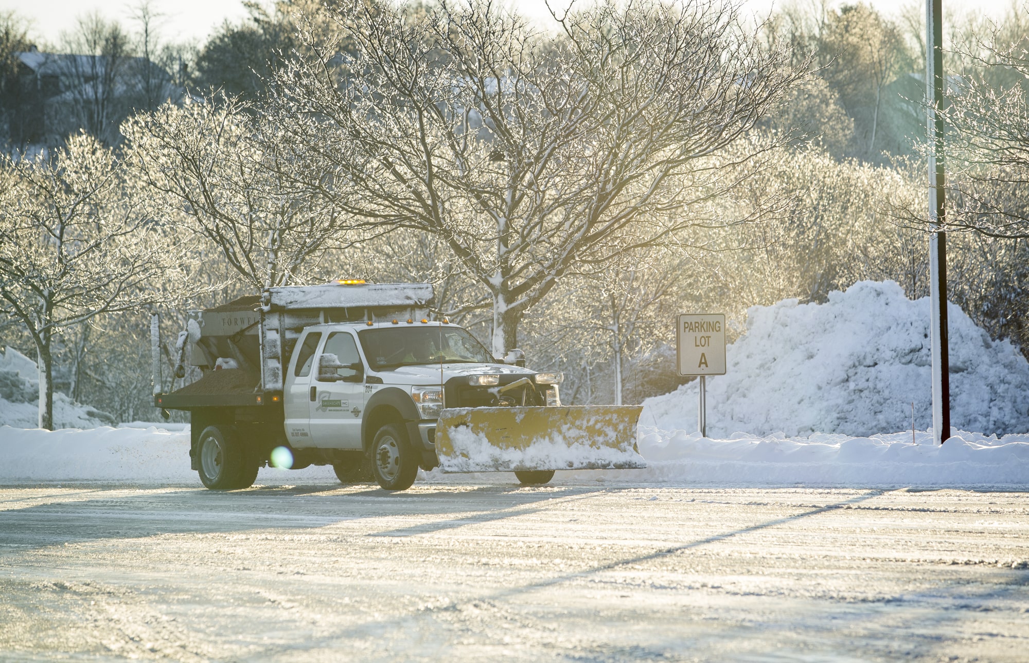 greenscape truck plowing snow